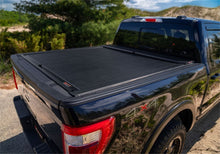 Load image into Gallery viewer, Roll-N-Lock 15-18 Ford F-150 XSB 65-5/8in M-Series Retractable Tonneau Cover